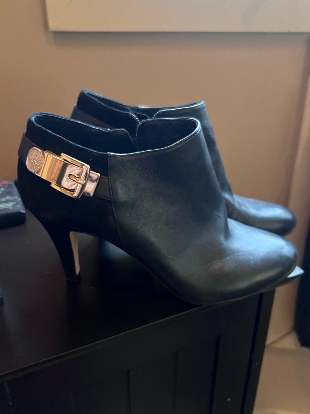 Vince Camuto Black Leather Ankle Booties with Gold Buckle Accent
